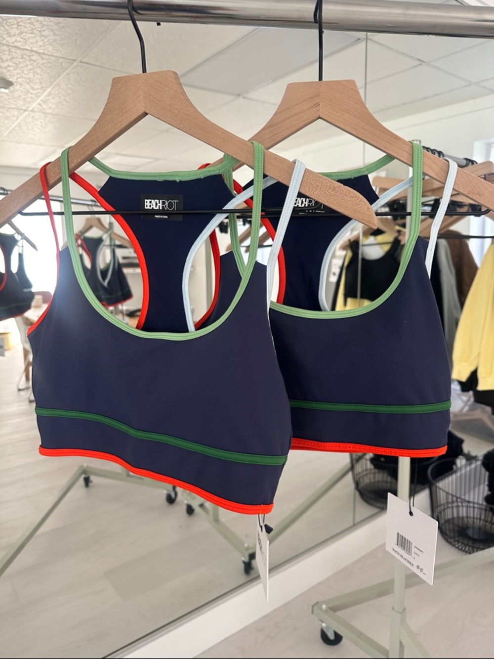 Beach Riot Navy Sports Bra with Green and Orange Trim
